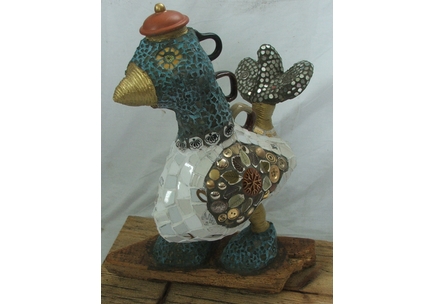 recycled mosaic bird sculpture  by Anne Schwegmann-Fielding
